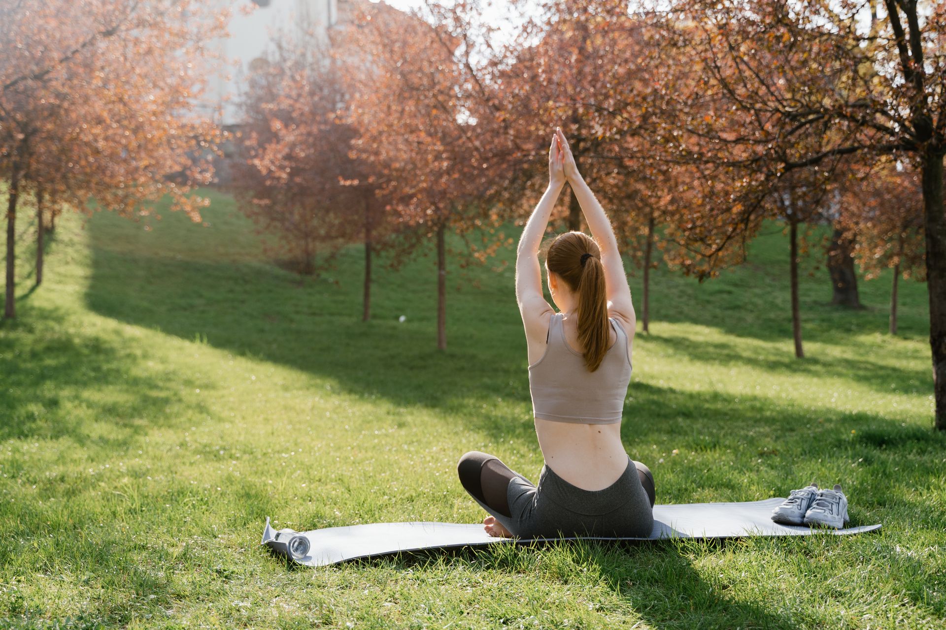 Person doing a home fitness workout outdoors without equipment